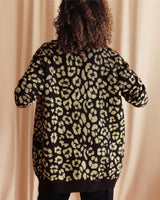 allrich-gilet noir en laine cachemire avec motif leopard metallise or